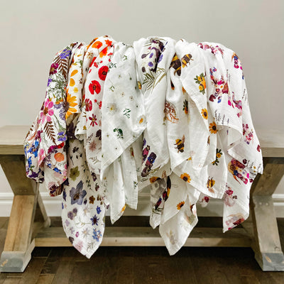 Pressed Floral Swaddles of various colours and patterns