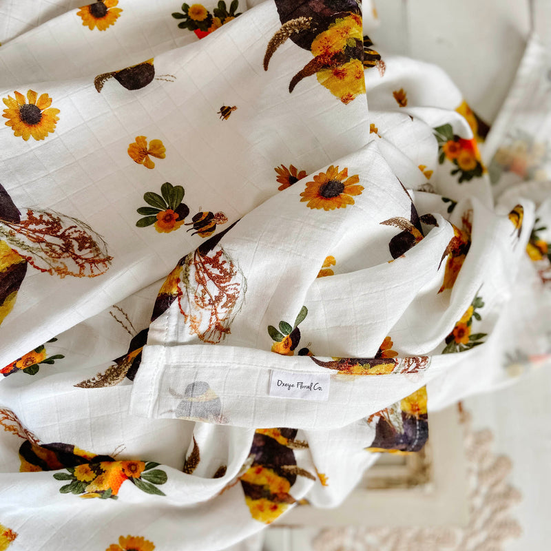 Floral Newborn Swaddle with Bumblebee Pattern