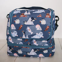 Blue lunch bag with flower arctic animal pattern by Oxeye Floral Co