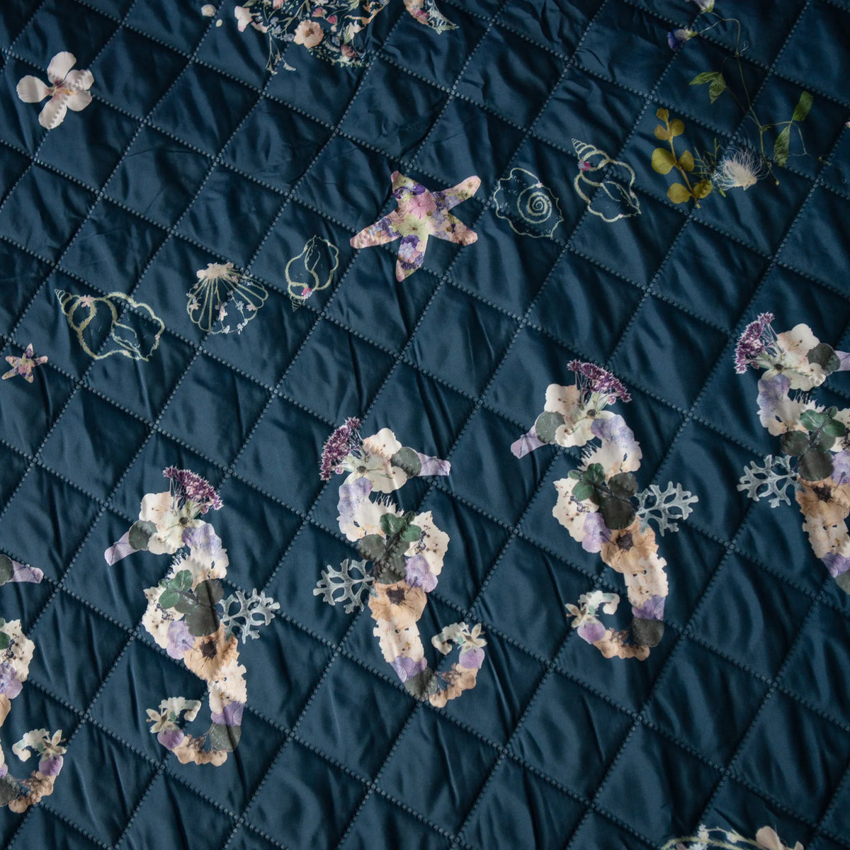 Seahorse and seashells on Coastal Drift Voyager Blanket by Oxeye Floral Co