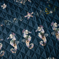 Seahorse and seashells on Coastal Drift Voyager Blanket by Oxeye Floral Co