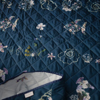 Double sided navy quilt with floral and shell patterns by Oxeye Floral Co