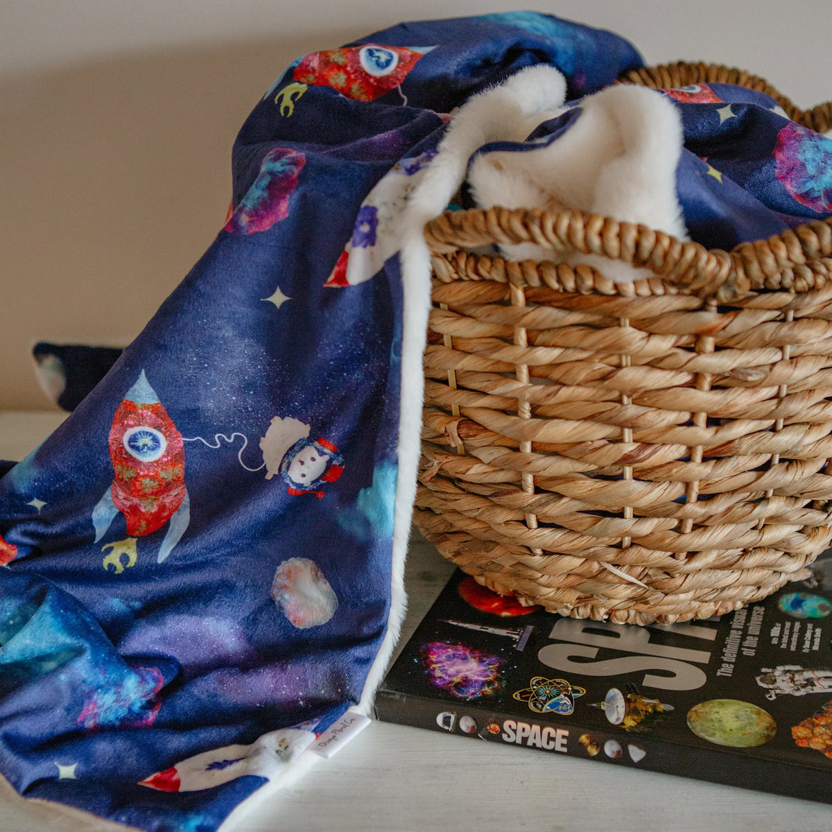 Cosmic Critters throw blanket by Oxeye Floral Co