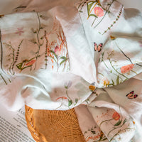 Muslin swaddle for girls with pressed meadow design
