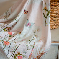Pressed flower and butterfly swaddle by Oxeye Floral Co