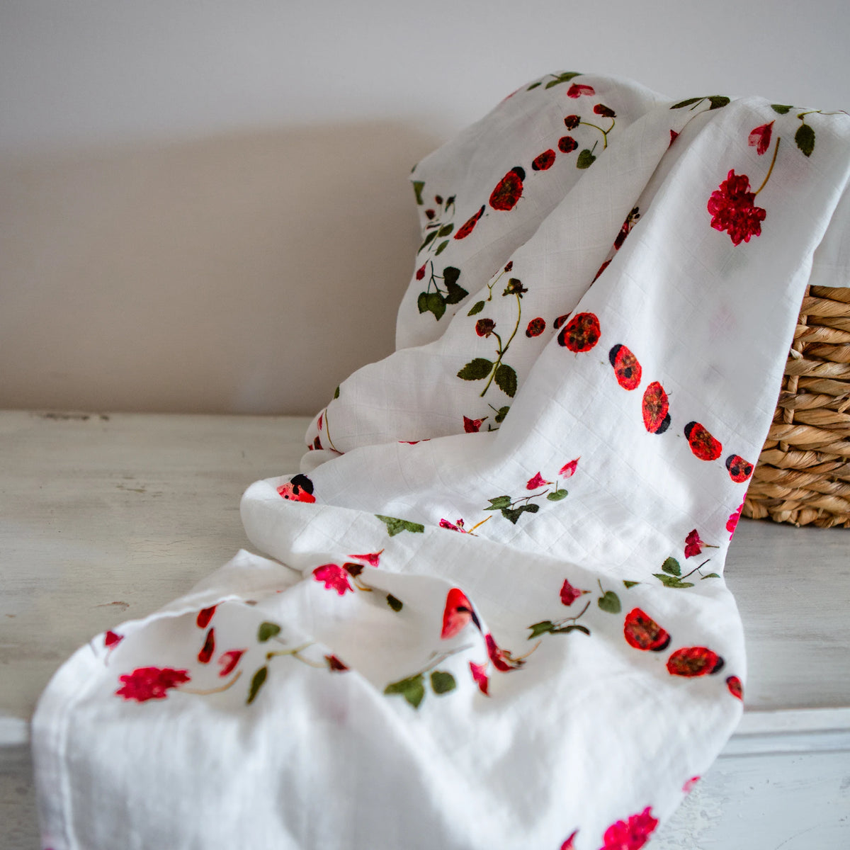 Detailed red ladybug swaddle by Oxeye Floral