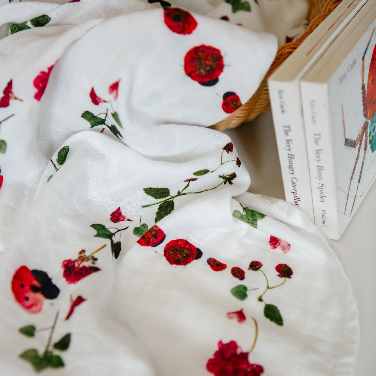 Ladybug swaddle with books
