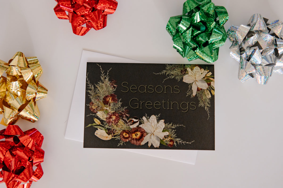 Seasons Greetings card with decorative florals