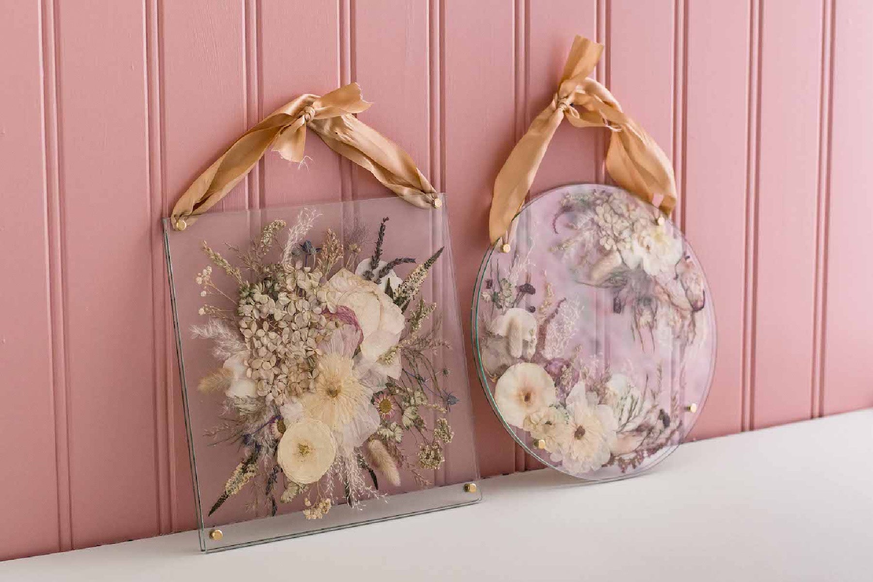 Preserved wedding bouquets in floating frame with ribbon