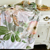 Botanical throw blanket with pressed floral design