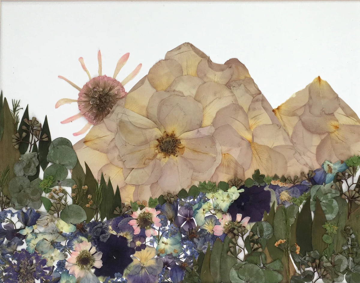 A mountain scene as pressed flower art