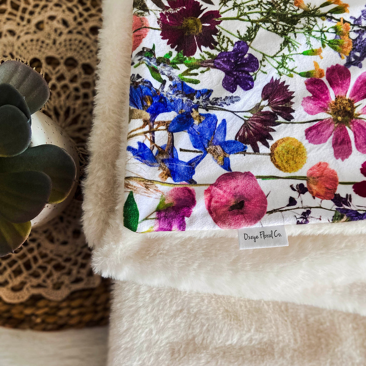 Meadow flower pattern on a soft throw blanket