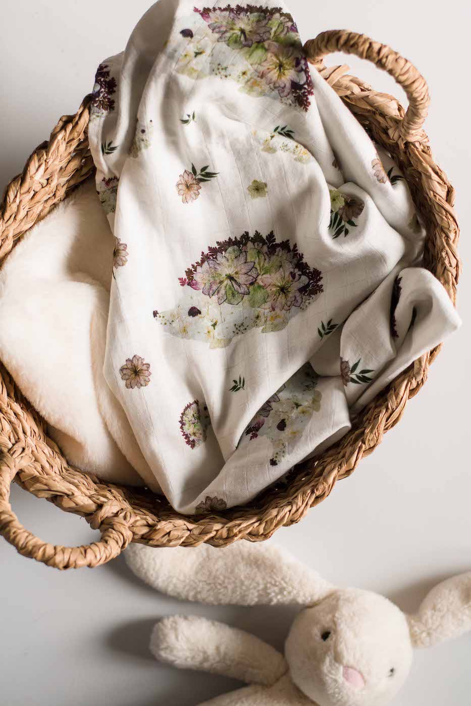 Cute pressed flower hedgehog baby swaddle by Oxeye Floral Co