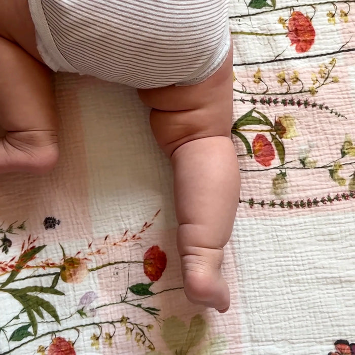 Baby on pressed flower cotton baby blanket