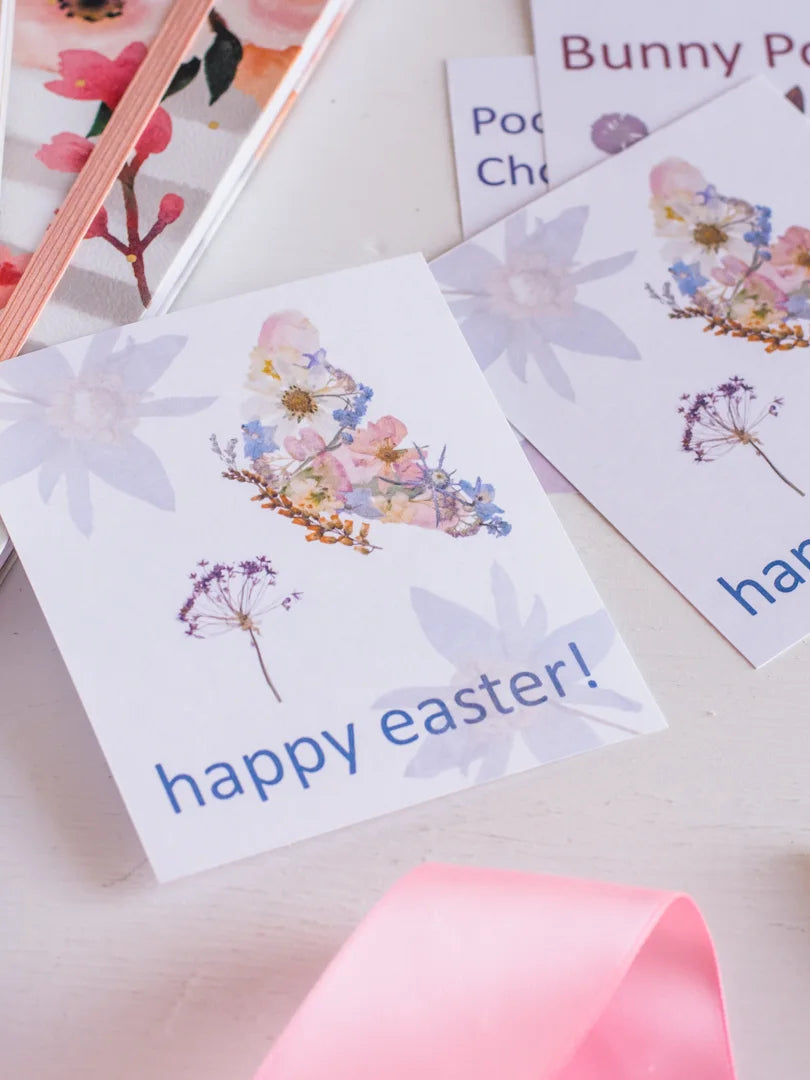 Happy Easter card with floral design on a light background