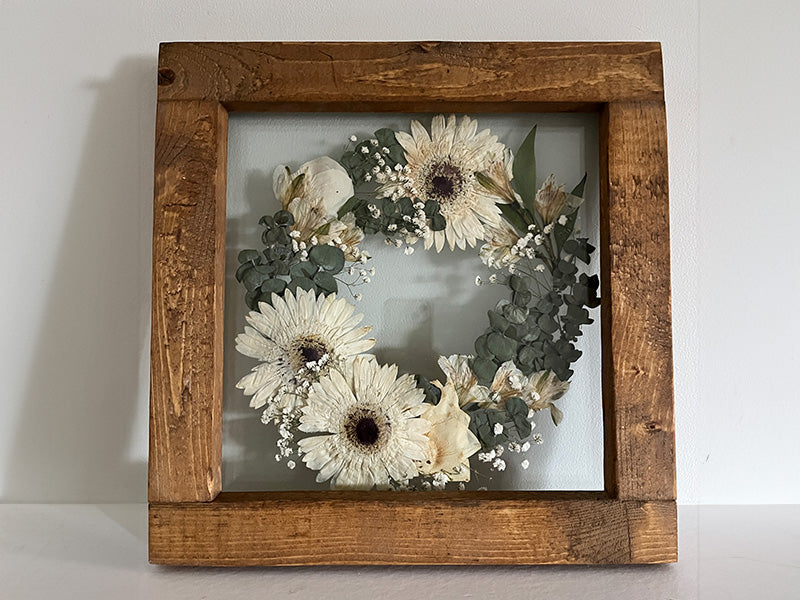 modern pressed flower wreath made from wedding flowers