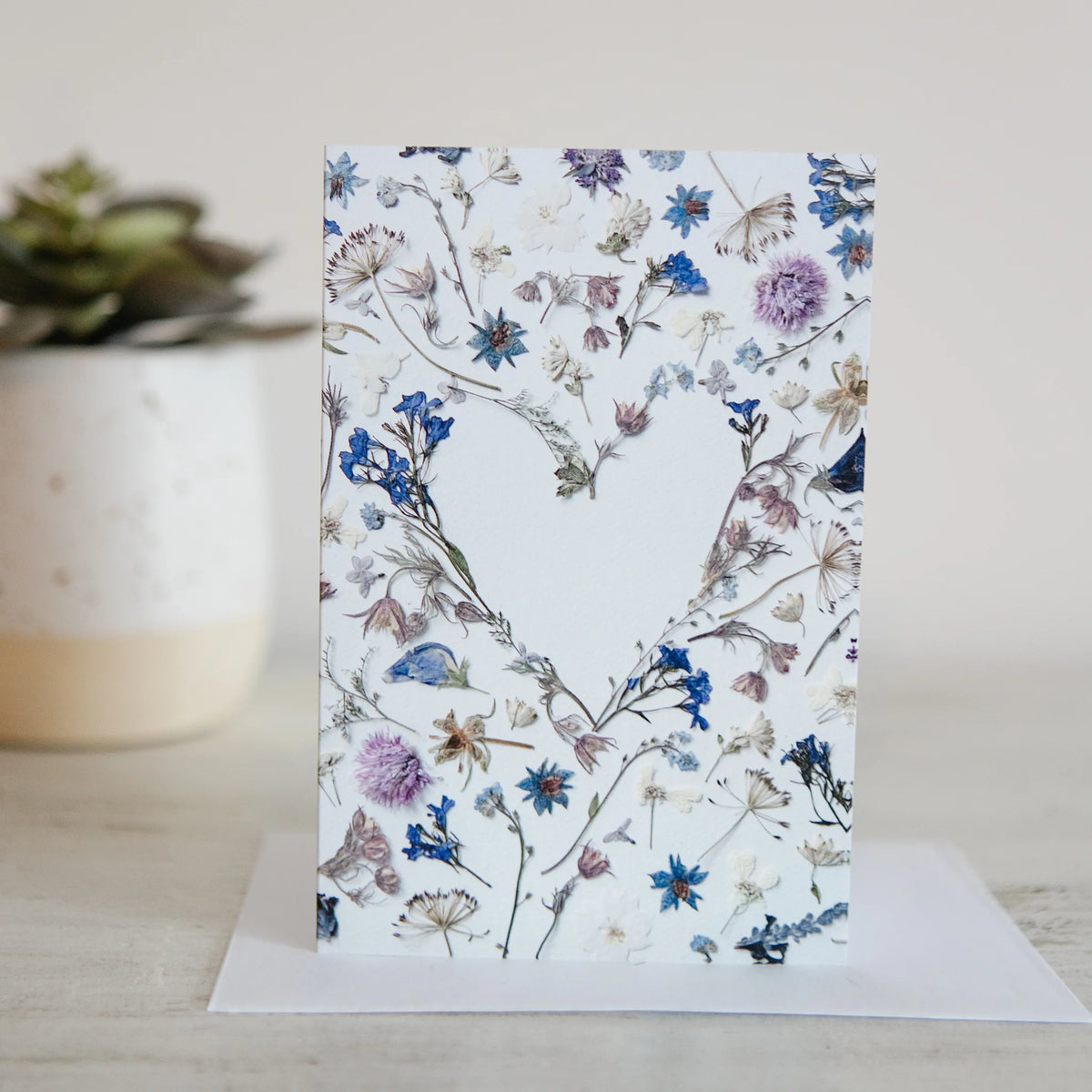 Greeting card with floral design on a white background