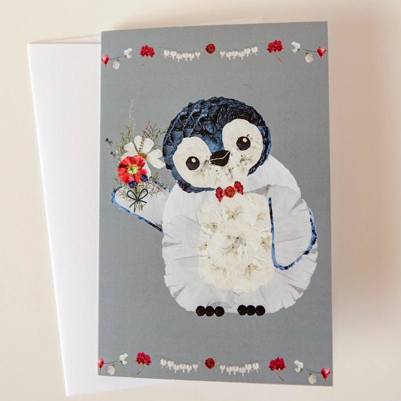 pressed flower penguin greeting card for holiday season