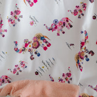 Floral baby blanket with elephants and a pink minky backing