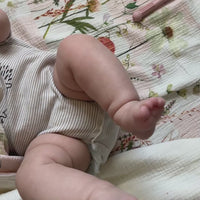 Baby on cosmo picnic pressed flower baby blanket