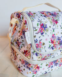 Bright  pressed flower lunch bag on a white background