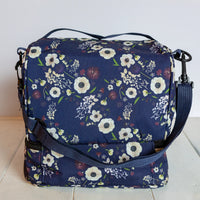 Floral lunch box with carrying strap